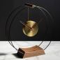 Preview: Small Design Table Clock "Mini Aire" made of Wood and Brass Ø 26 cm