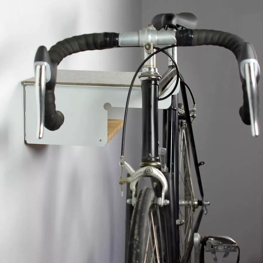 Wall holder for racing bicycles