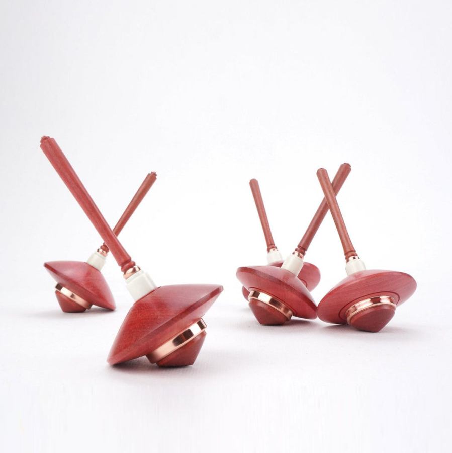 Eleganter Künstler-Holzkreisel aus Pink Ivory-Holz, Kupfer und Bein