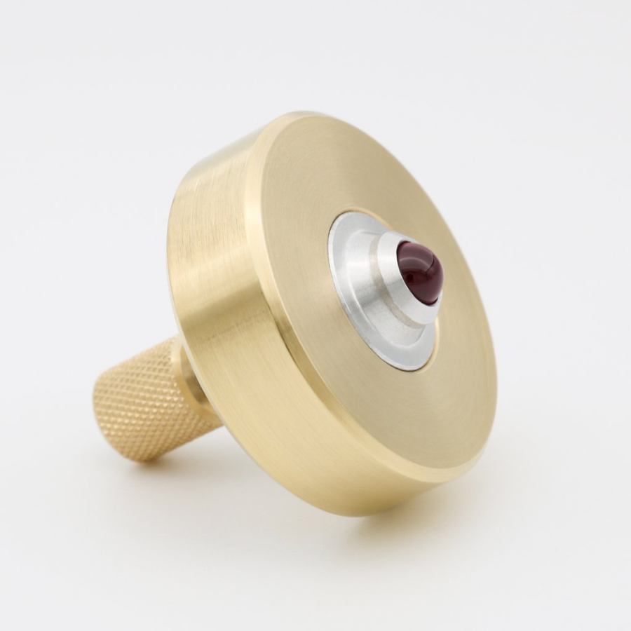 Brass spinning top ceramic bearing dish design over 6 min spin 