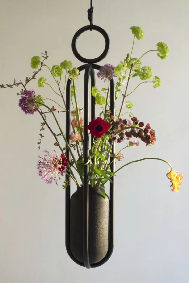 Another arrangement of cut flowers in the hard vase