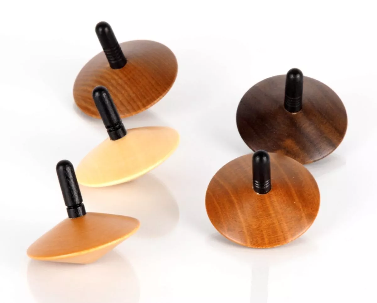 Kreisel-Set aus fünf Holzarten von Naef | Kunstbaron