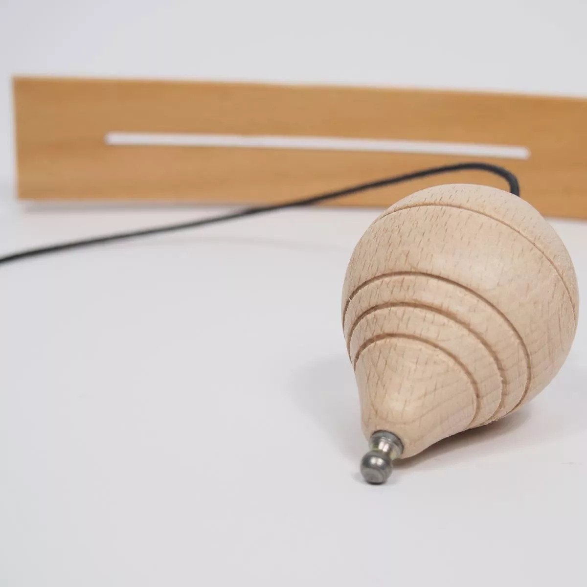 Decorative wooden balancing stand with pendulum