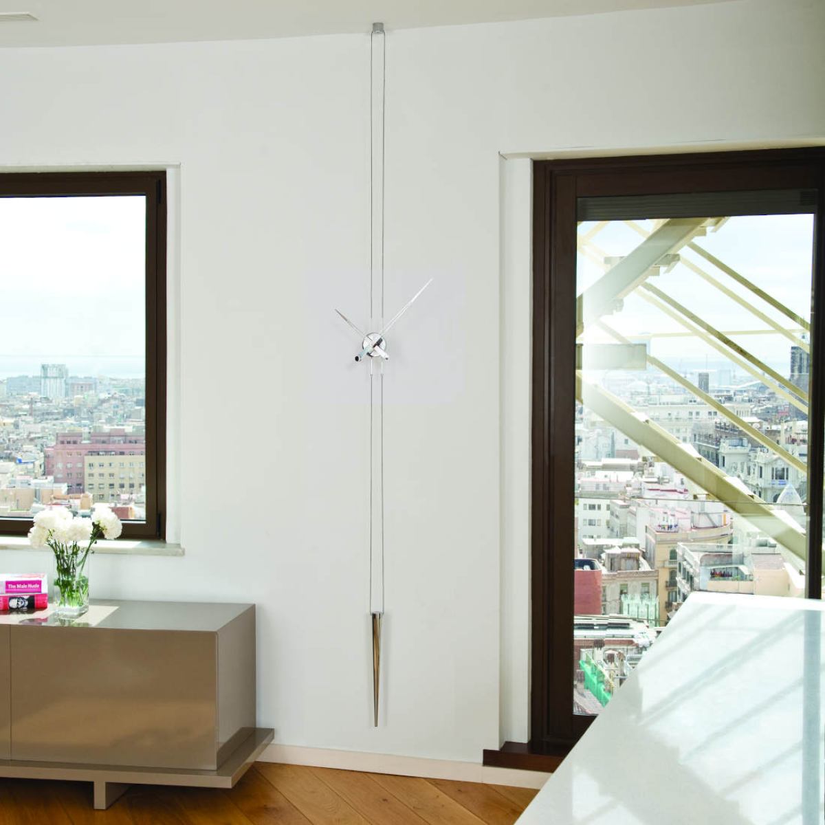 Suspended Wall Clock "Péndulo" made of Steel / Brass / Walnut Ø 74 cm